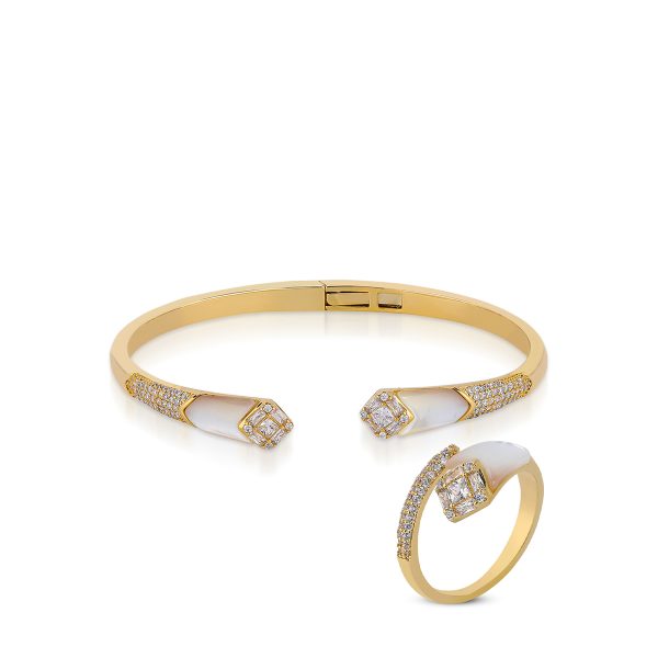 Gold bangle and ring set with sparkling stones, showcasing a chic open design for modern elegance.