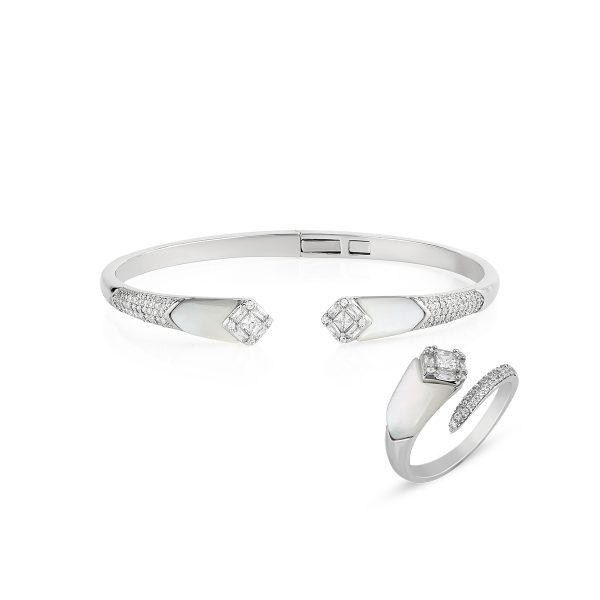 Elegant silver bangle and ring set with a modern open design, perfect for stylish everyday wear or special occasions.